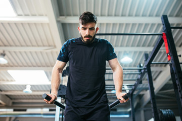 Fototapeta na wymiar bodybuilder man training in the gym