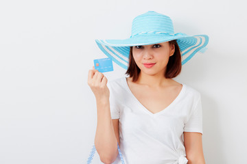 Fototapeta premium Woman in hat hand holding card