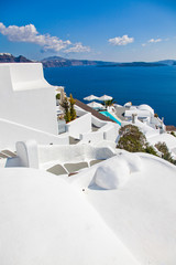 Fototapeta premium traditional white houses in Santorini, Cyclades islands Greece - amazing travel destination