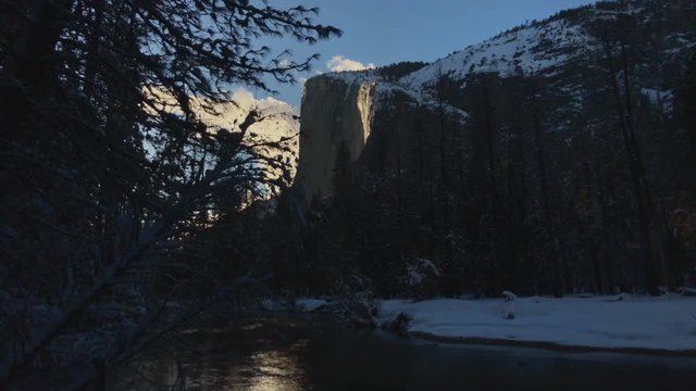 Yosemite Horsetail Falls firefall in winter on El Capitan from Merced River timelapse