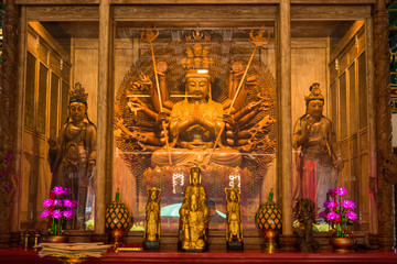 Guanyin Thousand hands of god image make of wood carving in chinese temple ,Thailand.