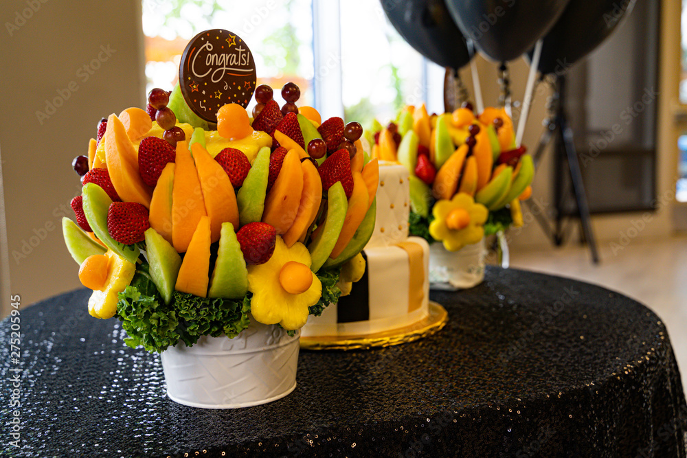 Wall mural edible fruit basket arrangement with a variety of fruits