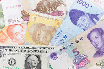 Money banknotes of different countries or currency exchanging background