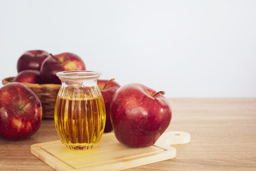 Close up red Apple fruit  and apple cider vinegar juice , Helps Lose Weight and Reduces Belly Fat ,...