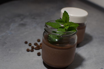 coffee dessert in a can with mint