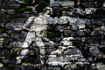 Construction worker symbol on brick wall