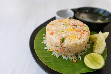 Crab meat fried rice of thai food with fry egg, vegetable and soup
