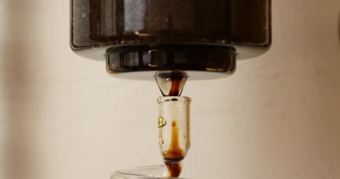 Making Dutch Cold Brew Coffee by Dripper(maker) : water, ground coffee, coiled glass tube, cold brewed coffee 