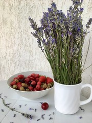 berries in a bowl on wooden table