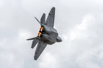 Advanced Tactical Fighter Jet Turning Away with Afterburners Firing