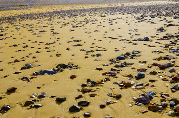 unusual Africa, Morocco, Atlantic Ocean, beach sand and pebbles