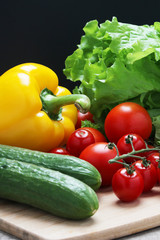 Bright vegetables at the table	