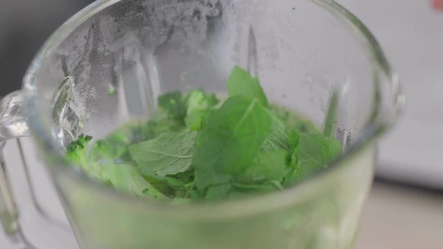 Preparing healthy green food in a blender - MALM FILM