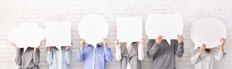 People holding empty speech bubbles at their faces