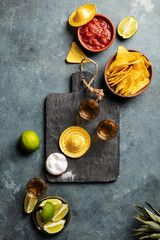 Mexican food and tequila shots, flat lay