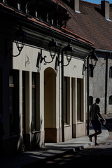 Vilnius, Lithuania A pedestrian in the Old town of Vilnius.