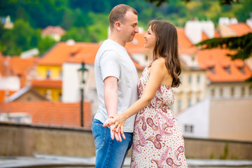 Fototapeta premium Young couple walking in old town of Prague
