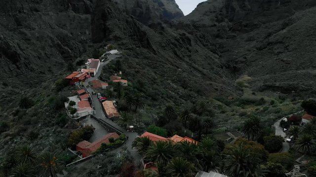 Little village in the gorge in the mountains, aerial view. Masca, Tenerife, Spain