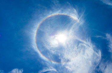 Halo of sun fantastic beautiful with circular , Natural colorful. in atmosphere  on blue sky...