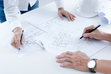 Colleagues interior designer Corporate Achievement Planning Design on blueprint Teamwork Concept...