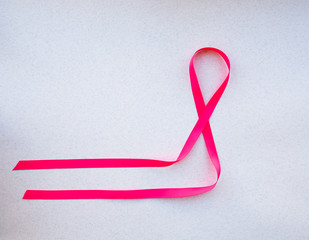 Pink satin breast cancer awareness ribbon