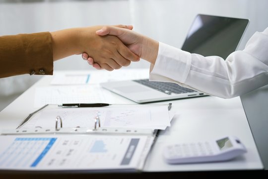 Image business mans handshake. Business partnership meeting concept