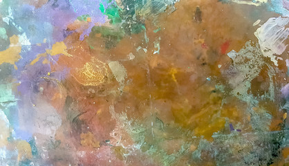 Fototapeta na wymiar Abstract, blur, bokeh background, defocusing - image for the background. Background image of bright oil-paint palette closeup