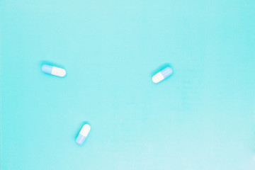 white capsules close up, pills capsules with white powder inside close up, coated medicine, medical...