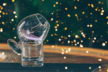 Sambuca cocktail at the bar stand. Luxury vacation concept. Horizontal. Festive holiday celebration bokeh