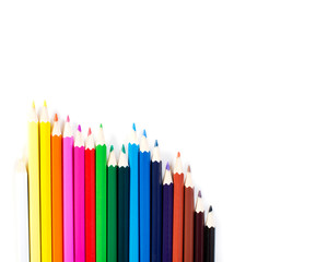 Colored pencils row isolated on white background.