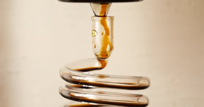 Making Dutch Cold Brew Coffee by Dripper(maker) : water, ground coffee, coiled glass tube, cold brewed coffee 