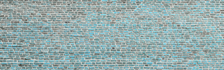 Brick wall, wide panorama of masonry. Wall with small Bricks