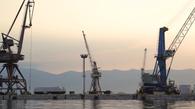 Image of Rijeka cargo port during scenic sunset, Croatia.