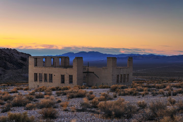 Sunset above abandoned building in Rhyolite, Nevada