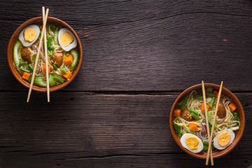 Obraz na płótnie Canvas Udon Noodle Soup with Vegetables. Vegetarian food.