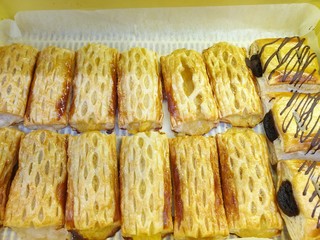 Top view of mini corn puff, pineapple puff and chocolate puff as a background for sale in the market, Ready to eat
