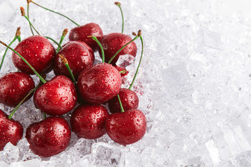 cherries on ice on a white background