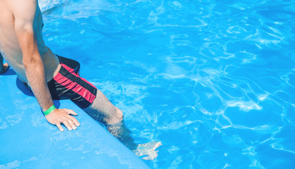 Caucasian man in the swimming pool.
