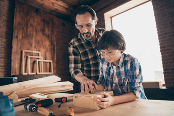 Portrait of attractive serious people person hold hand maker activity craftsmen workplace show...