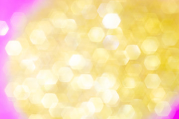 Obraz premium Blurred background - pink surface with gold sparkles. Abstract image. Bright color. Abstract circular bokeh.