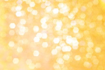 Blurred background - golden sparkles. Abstract image. Bright color. Abstract beautiful fasion bokeh.
