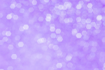 Blurred background - purple surface with sparkles. Abstract image. Bright color. Abstract beautiful bokeh.