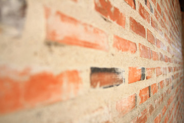 Brick wall texture beside view. Orange brick wall of house for background or texture.