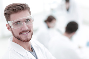 modern scientist on laboratory background