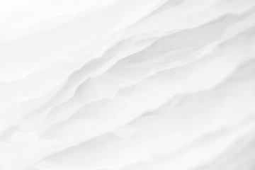 Closeup of white paper layers stack abstract art background. Blur snow mountain hills effect. Copy space.