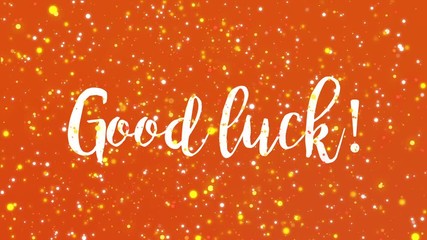 Sparkling orange Good luck animated greeting card with handwritten text.