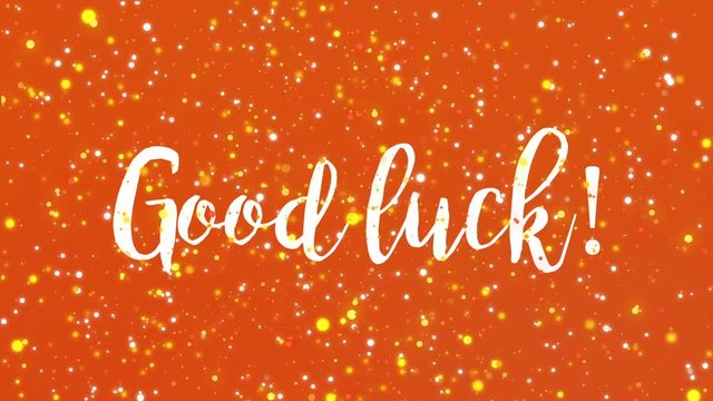 Sparkling orange Good luck animated greeting card with handwritten text.