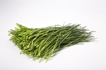 Fresh small Chives bunch isolated on white background