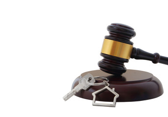 Judge gavel and key with house shape holder with room for text