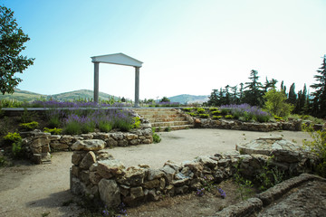 The wonderful Greek arch. amazing views of the vineyards and mountains of Crimea and flowering lavender. beautiful landscape of mountains and grapes and lavender